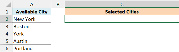 Cell C2 ready for city selections after returning from the Visual Basic Editor.
